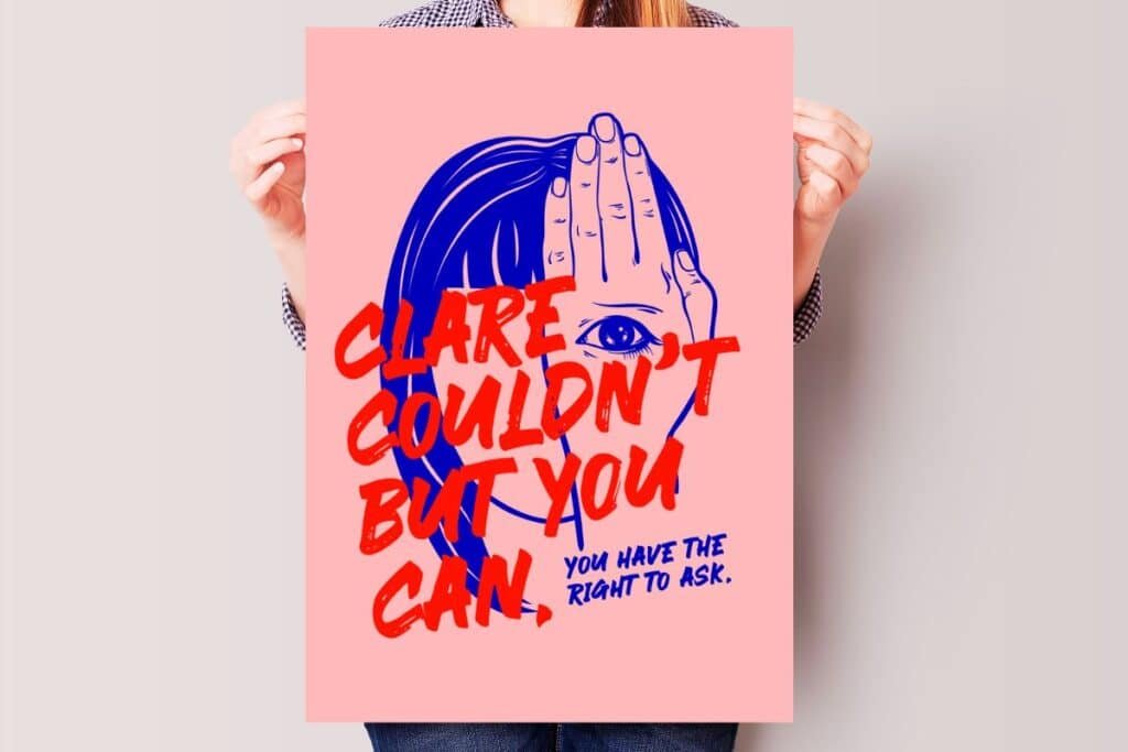 Female holding a poster to promote Clare's Law