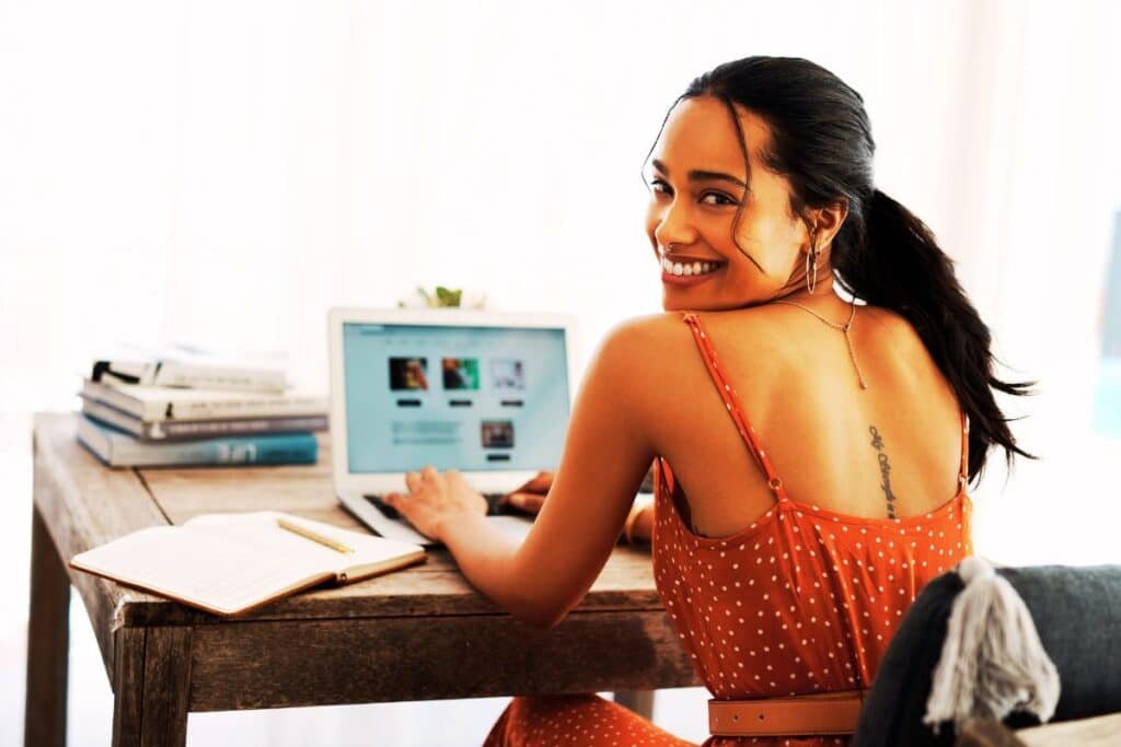 woman has just started a blog and is smiling because of this